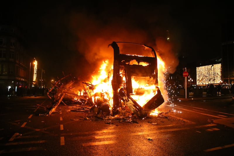 A bus set on fire on Dublin's O’Connell Street on Thursday night,
Photograph: Stephen Collins/Collins Dublin