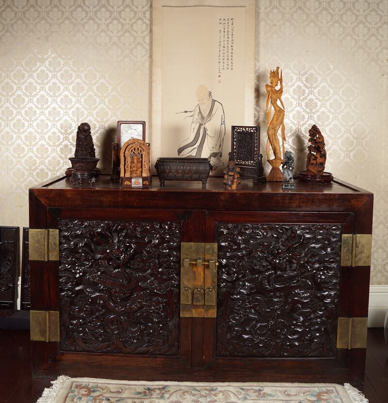 The sale has two Chinese Qing dynasty hardwood palace cabinets with dragon carved doors (€20,000-€30,000 apiece)