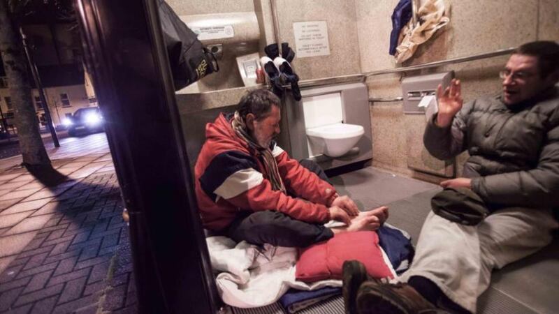 Hard times: Josef Pavelka, the Czech who died in May 2012, with Peter Baram, a Pole, in the public toilet in Ennis, Co Clare, that served as their makeshift home. Photograph: Eamon Ward