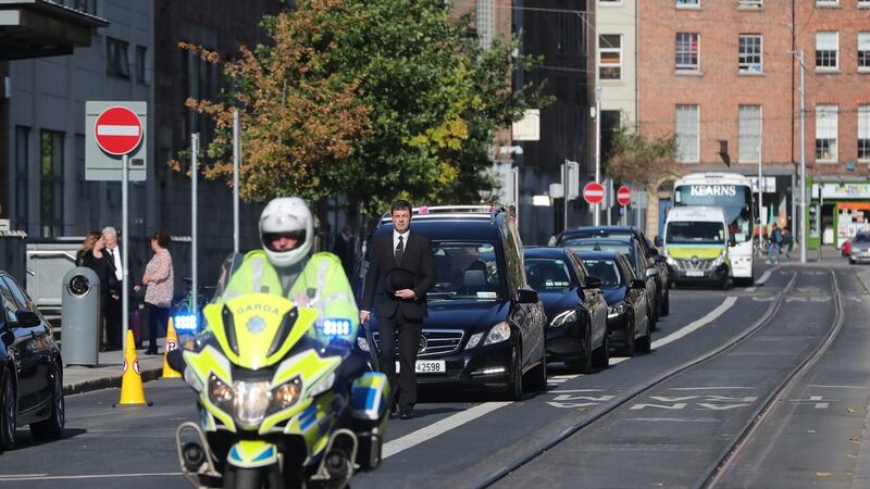 The  cortege of Emma Mhic Mhathúna arrives at  Pro-Cathedral in Dublin for her funeral Mass. Photograph: Niall Carson/PA Wire