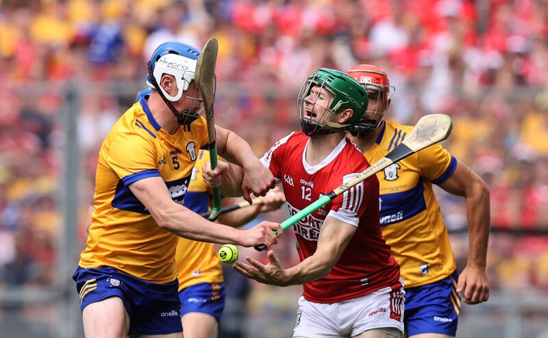 Clare's Diarmuid Ryan and Seamus Harnedy of Cork during the All-Ireland SHC final. Photograph: Bryan Keane/Inpho