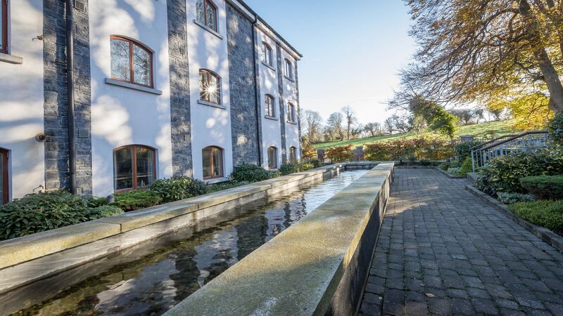 Building materials to emulate the old mill ruin were used where feasible in two blocks, giving a timeless look to the exteriors