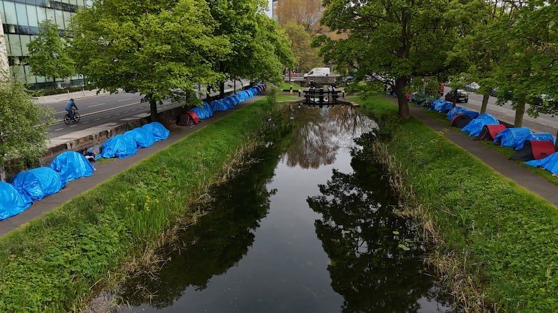 Tents pitched by asylum seekers along a stretch of the Grand Canal in south Dublin near to the International Protection Office (IPO) on Mount Street. Photograph: Niall Carson/PA Wire