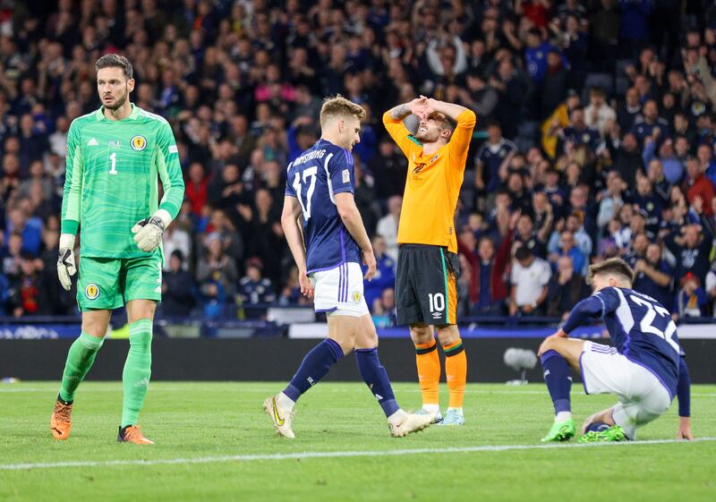 Troy Parrott reacts after missing a chance that Scotland goalkeeper Craig Gordon saved. Photograph: Robert Perry/EPA