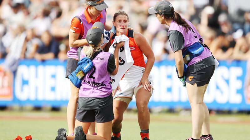 Cora Staunton is treated for her facial injury  at Melbourne’s  Olympic Park. Photo by Michael Dodge/Getty Images