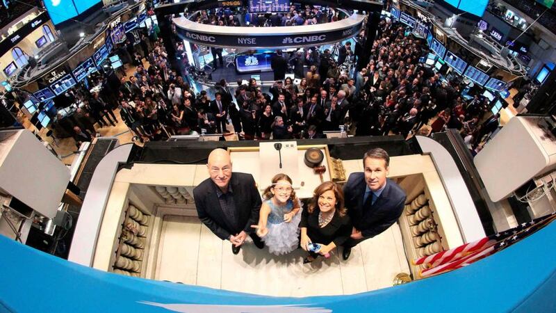Actor Patrick Stewart, nine-year-old Vivienne Harr, Cheryl Fiandaca of the Boston Police Department and Twitter co-founder Evan Williams pose before ringing the opening bell at the New York Stock Exchange in New York. Photograph: NYSE/Handout via Reuters
