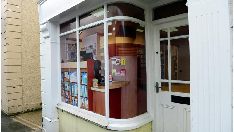 A small business premises in Belcoo, Co Fermanagh, in which a pharmacy was formerly located, has been made to look like an office supplies store. Photograph: Bryan O’Brien
