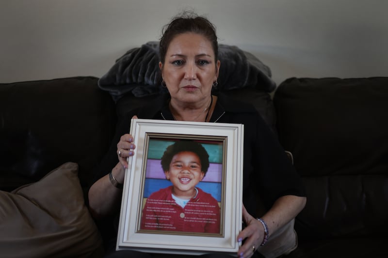 Áine Flanagan holds a photograph of her five-year-old daughter, Shauna Flanagan-Garwe. Photograph: Bryan O’Brien