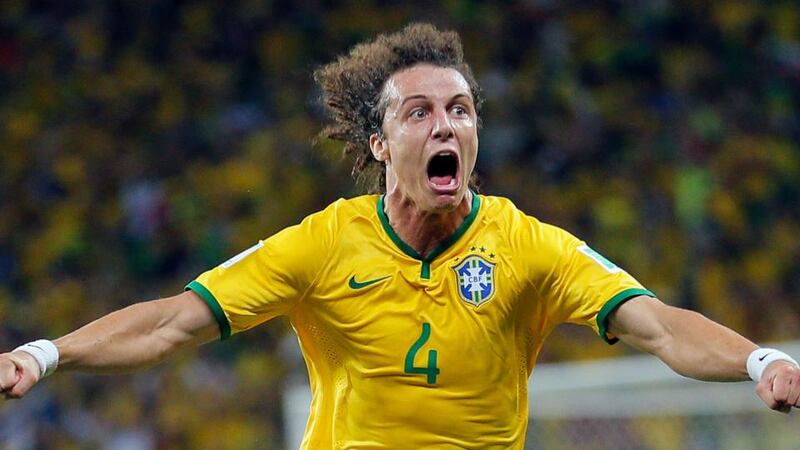 David Luiz  celebrates after scoring his side’s second goal from a free-kick against Colombia during the World Cup quarter-final at the Arena Castelao in Fortaleza. Photograph: Sergey Dolzhenko/EPA
