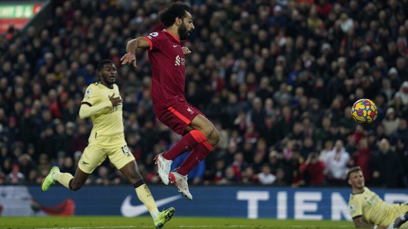 Mohamed Salah scores Liverpool’s third in their 4-0 thrashing of Arsenal. Photograph: Tim Keeton/EPA