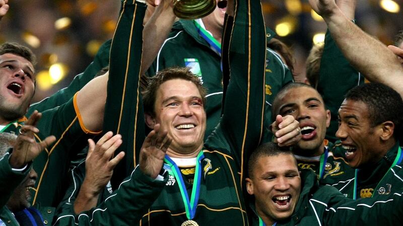 South Africa’s John Smith  with the Webb Ellis Cup in 2015. Photograph:Billy Stickland/Inpho