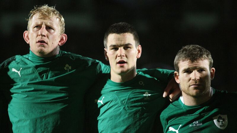 Johnny Sexton lines up beside Leo Cullen and Gordon D’Arcy ahead of his Ireland debut against Fiji on a wet and wild night at the RDS in November 2009. Photograph: Lorraine O’Sullivan/Inpho