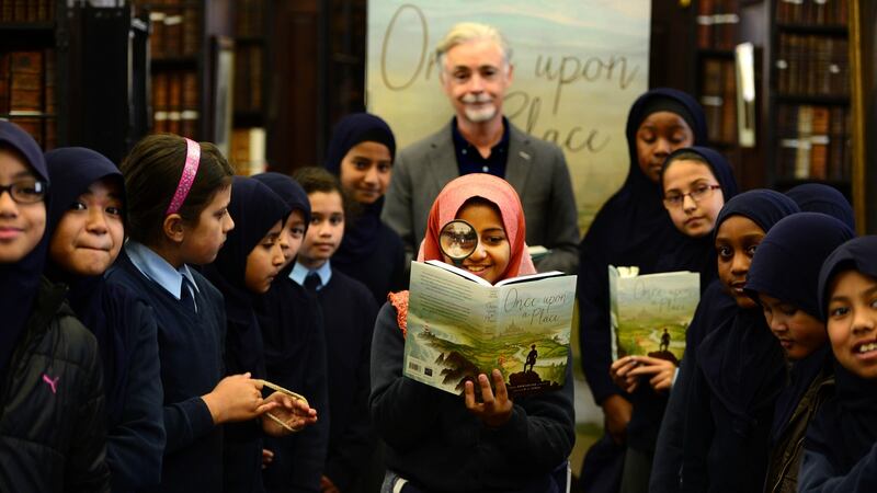 Pupils from the North Dublin Muslim School at the launch of Once Upon a Time with Eoin Colfer  at Marsh’s Library. Photograph: Cyril Byrne
