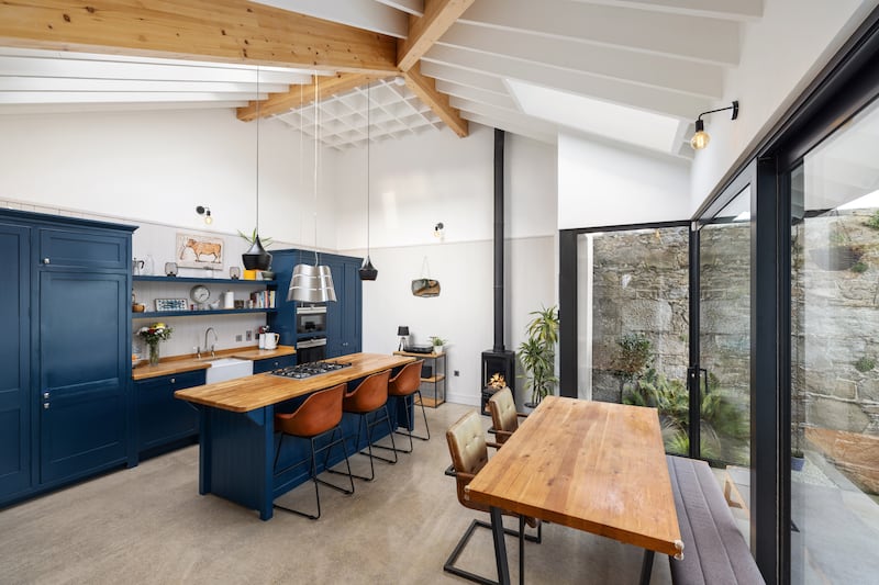 Kitchen/dining area with sliding doors to garden. Photograph: Andrew Nolan