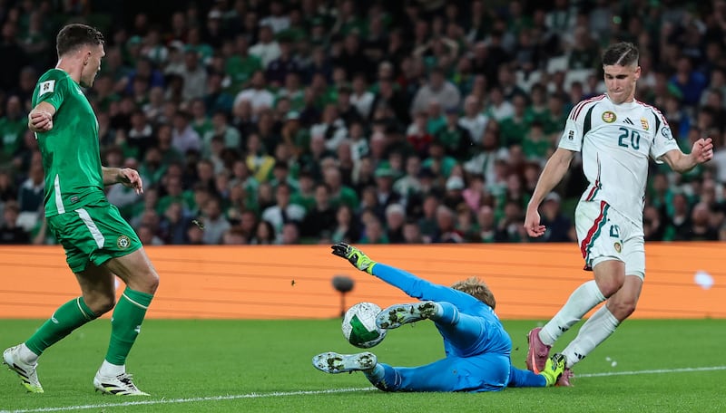Caoimhín Kelleher saves an effort from Hungary's Roland Sallai. Photograph: James Crombie/Inpho