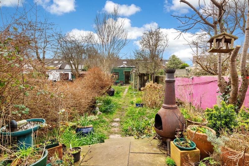 Back garden with rear access to lane.