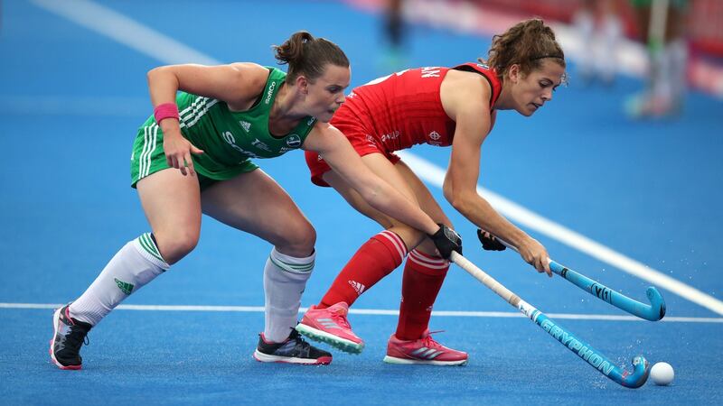 Ireland’s Lizzie Colvin  battles for possession with England’s Anna Toman. Photograph: John Walton/PA Wire