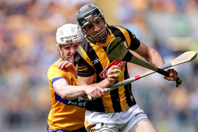 Tom Phelan of Kilkenny blocks off Adam Hogan of Clare in the All-Ireland semi-final. Photograph: Laszlo Geczo/INPHO