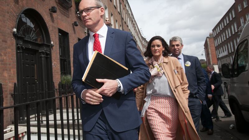 Fine Gael leadership candidate Simon Coveney arriving with Fine Gael TD Kate O’ Connell for the launch of his  policy document in Dublin. Photograph: Collins