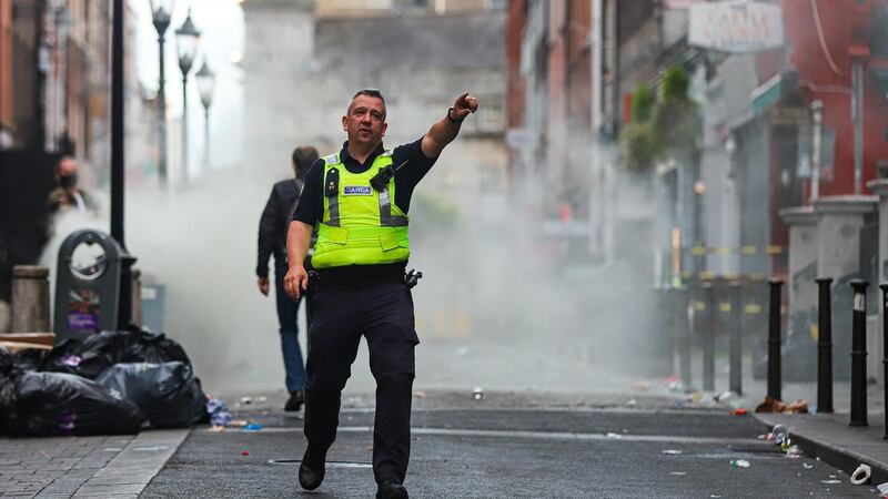 Gardaí clear South William Street in Dublin on Saturday evening after a fire broke out in a bin. Photograph: Damien Storan