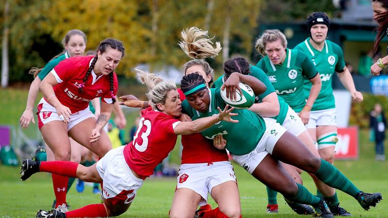 Ireland’s Linda Djougang scores the first try of the game. Photograph: Tommy Dickson/Inpho