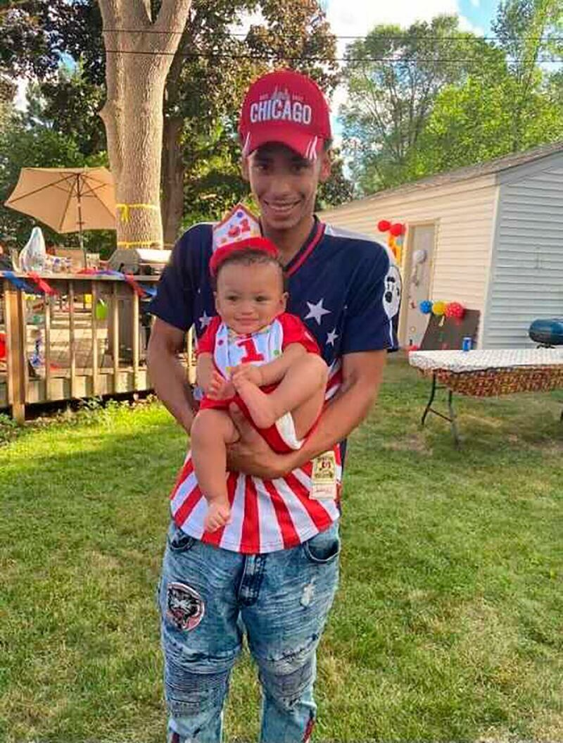 Daunte Wright, who was shot and killed by a police officer during a traffic stop on April 11th, pictured with his son Daunte jnr at his first birthday. Photograph: Ben Crump Law, PLLC/AP
