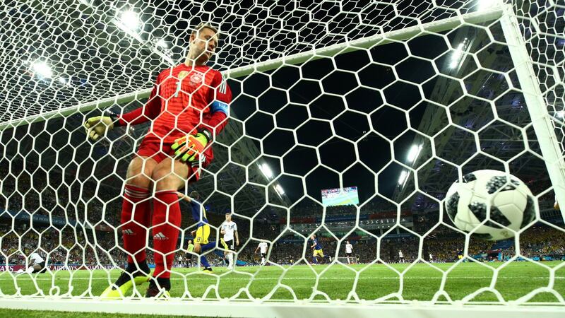 Germany’s Manuel Neuer was unable to keep Ola Toivonen’s lob out. Photograph: Michael Dalder/Reuters