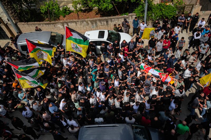 Palestinian mourners carry the body of Yazan Shtayeh for burial, who was killed during clashes with Israeli forces in the village of Salem in Nablus on April 15th. Photograph: Wahaj Bani Moufleh/Middle East Images/AFP via Getty Images)
