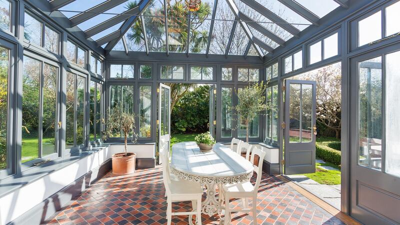 The Ulverton property features a conservatory where olive trees and tomatoes are happily growing away.