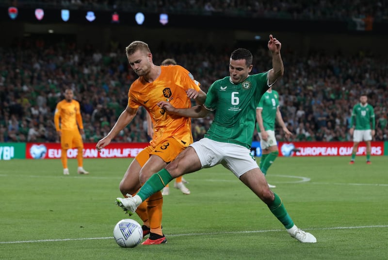 Netherlands' defender Matthijs De Ligt and Ireland's midfielder Josh Cullen compete. Photograph: Getty Images