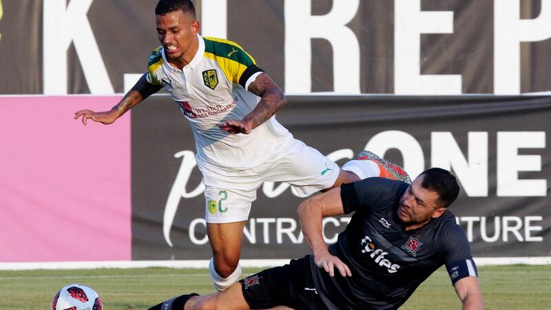 AEK’s Igor Carioca is tackled by Brian Gartland. Photo: Savvides Press Sports