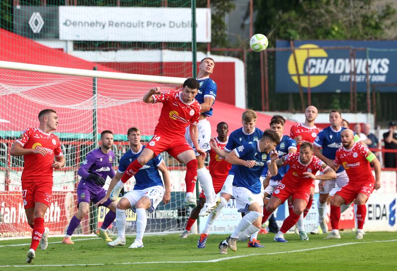 Linfield's Ethan McGee and Shelbourne's Ali Coote battle for the ball. Photograph: Damien Eagers/PA