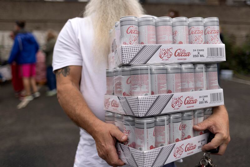 Bohemians hosted a 'Solidarity Market' at Dalymount Park to sell 30,000 cans of Gaza Cola by the slab. The club is donating all proceeds to rebuilding the Al Karama Hospital in Gaza. Photograph: Chris Maddaloni/ The Irish Times