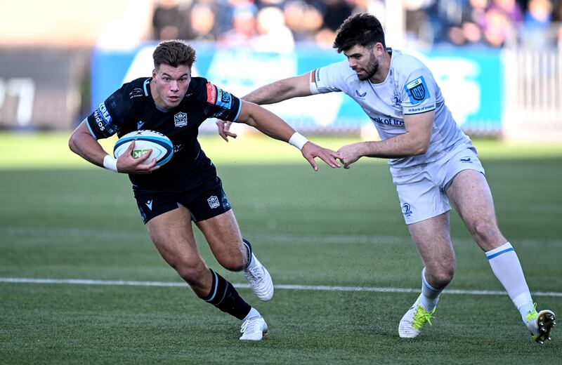 Glasgow’s Huw Jones with Harry Byrne of Leinster. Photograph: Craig Watson/Inpho