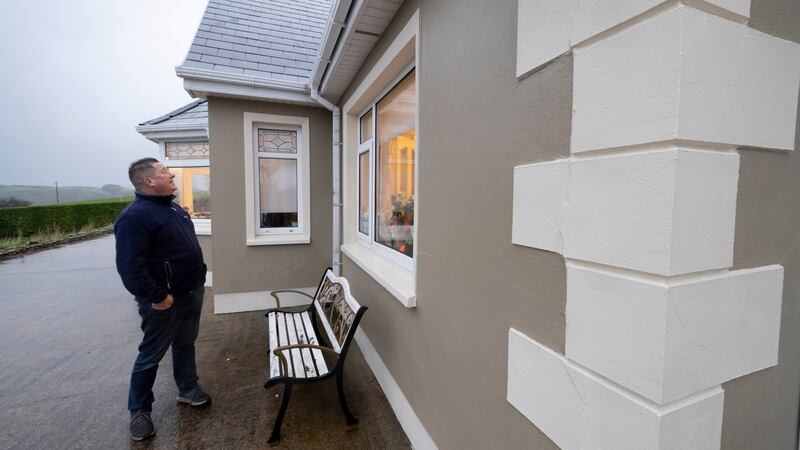 Sean Gibbons outside his mica-affected home in Kerrykeel. ‘I’m filling and painting the cracks every year,’ he says. Photograph: Joe Dunne