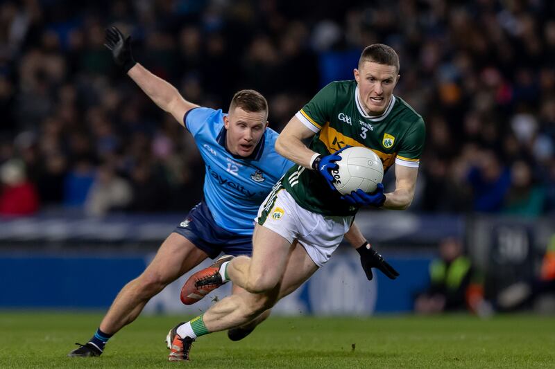 Dublin’s Ciaran Kilkenny with Jason Foley of Kerry who suffered a bad ankle injury against Roscommon. Photograph: Morgan Treacy/Inpho 