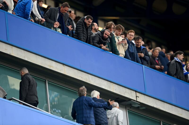 Chelsea chairman Todd Boehly speaks to fans during the Premier League match against Brighton at Stamford Bridge. Photograph: Alex Davidson/Getty Images