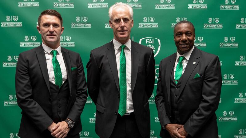 Republic of Ireland manager Mick McCarthy with assistant coaches Robbie Keane and Terry Connor at Sunday’s FAI awards ceremony at the RTE studios. Photograph: Bryan Keane/Inpho