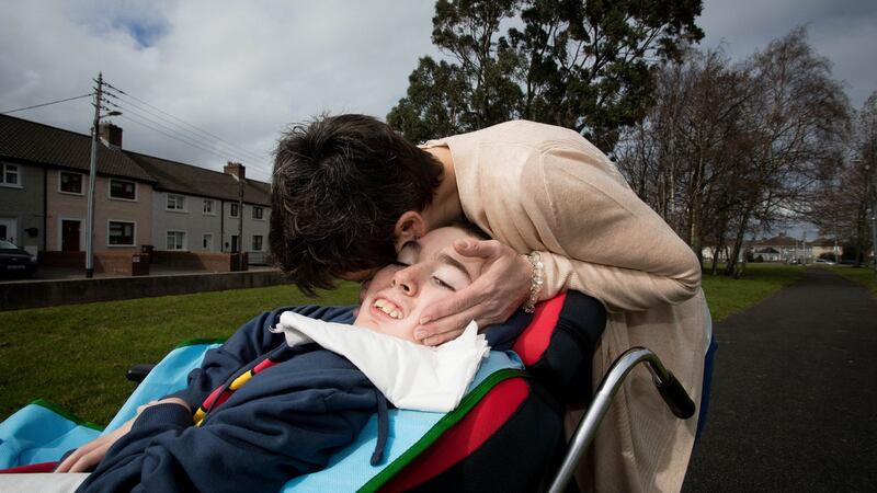 Muriel Slevin with her son Morgan D’Arcy at Our Lady’s Children’s Hospital, Crumlin: “We are each other’s world . . . Morgan has had me by his side his whole life.” Photograph:  Tom Honan