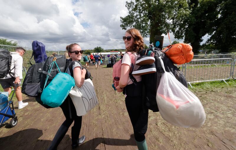 Campers laden down with gear arriving at Electric Picnic 2023. Photograph: Alan Betson