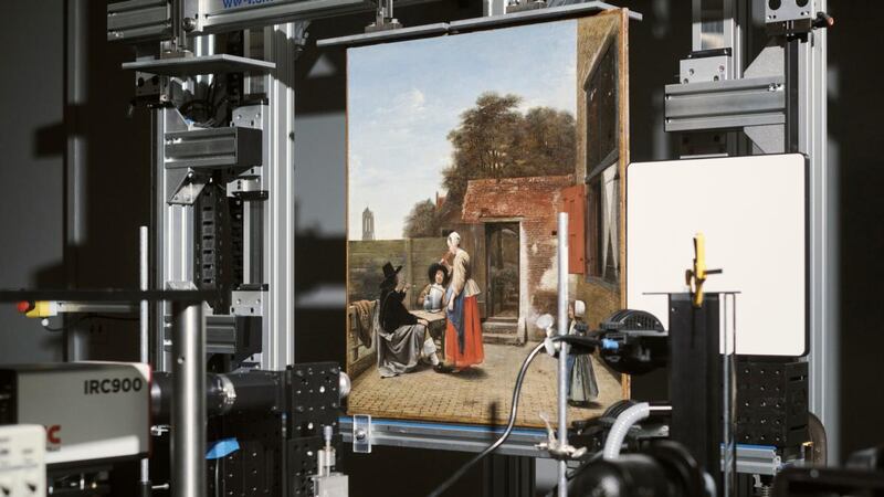 A Dutch Courtyard by Pieter de Hooch, a contemporary of Vermeer’s, is scanned at the National Gallery of Art in Washington. High-tech scanning techniques used by geologists, planetary scientists, drug companies and the military are revealing secrets of how artists created their masterpieces. Photograph: TJ Kirkpatrick/The New York Times