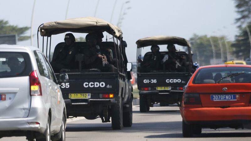 Security forces drive towards Grand Bassam in Abidjan, Ivory Coast. Photograph: Joe Penney/Reuters