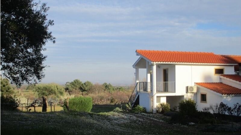Wine country: House in northeast of Lisbon with vines and fruit trees.