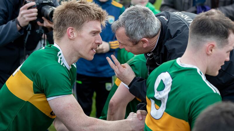 Kerry manager Peter Keane has a word with Tommy Walsh after the game against Galway. Photograph: Morgan Treacy/Inpho