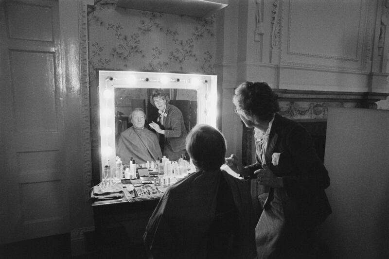 1983: RTÉ make-up artist Pat O’Dwyer prepares Fianna Fáil leader Charles Haughey for a photo-shoot. Photograph: Des Gaffney/RTÉ