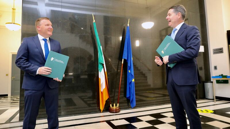 Minister for Finance Paschal Donohoe (right) and Public Expenditure Minister Michael McGrath outside Government Buildings in Dublin before outlining the budget to the Dáil. Photograph: Julien Behal Photography/PA