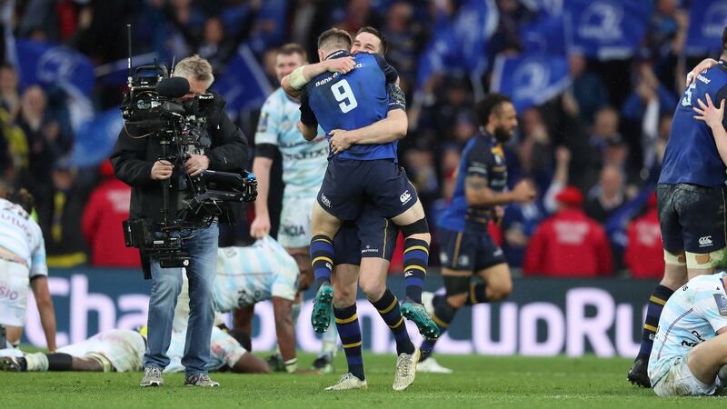Leinster’s Jonathan Sexton and Luke McGrath celebrate at the final whistle. Photograph: Billy Stickland/Inpho