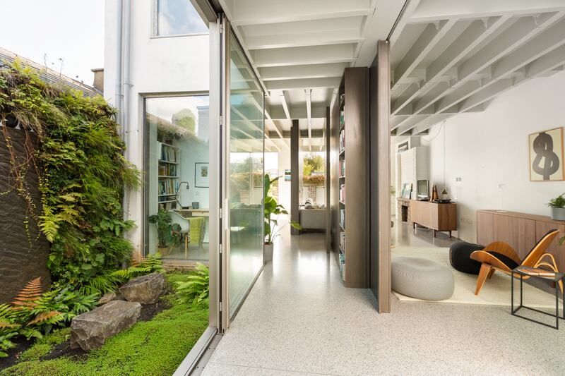 Irrigated vertical planting in the courtyards