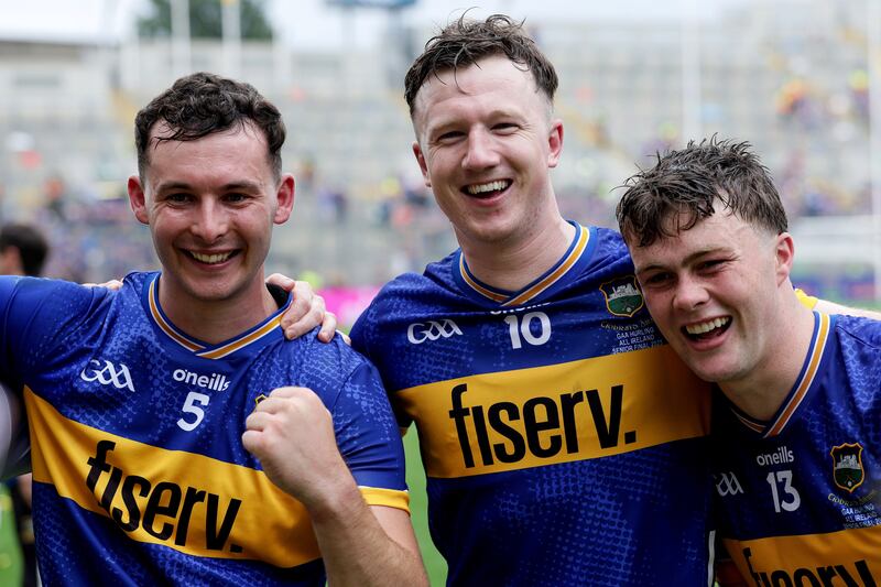 Tipperary's Craig Morgan, Jake Morris and Darragh McCarthy celebrate after the game. Photograph: Laszlo Geczo/Inpho