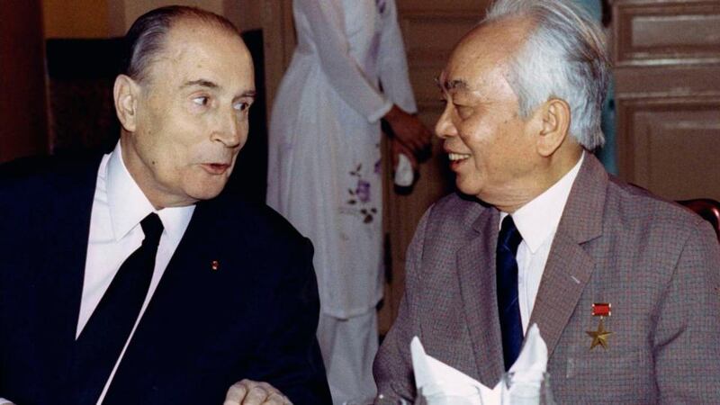 Former French president Francois Mitterrand (left) speaks with former Vietnamese General Vo Nguyen Giap during a state banquet in this Hanoi in  1993. Photograph: Jacky Naegelen/Files/Reuters